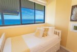 The bedroom includes a trundle bed with two new foam mattresses and beautiful ocean views